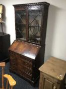 A Regency style reproduction bureau bookcase