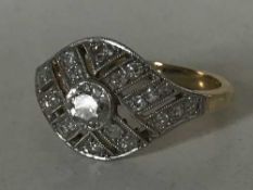 An 18ct gold diamond set Art Deco ring