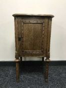 An Edwardian oak pot cupboard