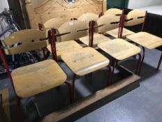 Seven wooden metal leg school chairs