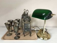 A tray of six plated goblets, pair of contemporary metal candle holders,