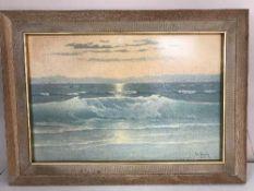 A gilt framed mirror, an Aldo print,