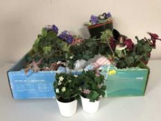 Three boxes of artificial flowers, wicker planters,