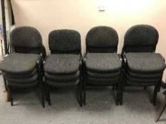 Sixteen black metal leg stacking chairs