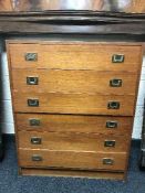 A continental six drawer teak chest