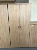 A double door office stationary cupboard,