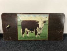 A hand painted mirror, picture of a bull on wooden board H J Jennings & Sons ltd,