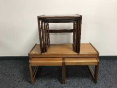 Two nests of three teak tables