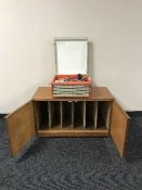 A mid 20th century Westminster table top record player and record cabinet