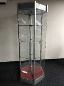 A hexagonal floor standing display case