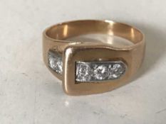 A diamond set buckle ring,