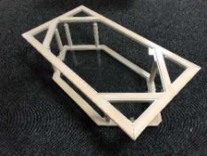 A contemporary washed pine coffee table