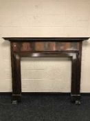 An early 20th century mahogany fire surround
