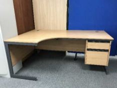 An office corner desk and four office tables