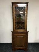 A Regency style corner cabinet