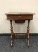 An inlaid mahogany work table