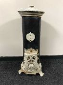 An antique cast iron stove by Godin