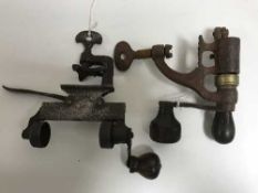 A box of two antique miniature vices