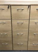 Four drawer wood effect filing cabinet with key