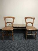 A mahogany coffee table and a pair of Victorian dining chairs