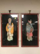 A pair of Oriental embroidered pictures depicting figures
