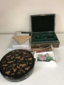 A tray of hand fans,