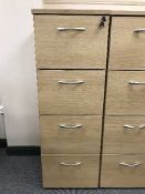 Four drawer wood effect filing cabinet with key