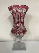 A large ruby crystal vase
