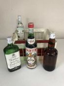 A crate of six bottles of alcohol - 75cl bottle Gordons Gin, 70cl bottle Bacardi, Haig whiskey,