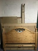 A boxed pine Monteray 4'6 bed frame