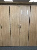A double door office stationary cupboard,