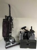 A Kirby Micron Magic vac with accessories