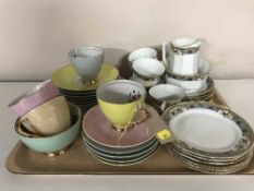 A tray of two continental part china tea sets