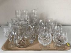 Two trays of lead crystal drinking glasses,