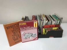 A box containing a quantity of assorted books, sheet music,