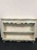 A shabby chic wall shelf