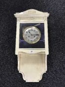 A continental painted wall clock