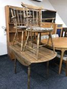 A Dinetta drop leaf table and two chairs