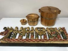 Three graduated pine rice pots with lids and a carved Eastern panel