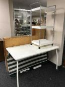 A PC table and a white metal trolley plus two garden loungers