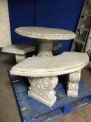 A large concrete pedestal garden table and two benches