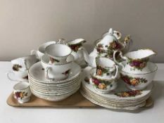 A tray containing a English bone china floral tea service together with 7 pieces of Royal Albert