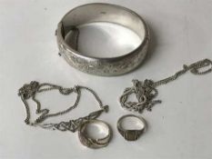 A silver bangle,