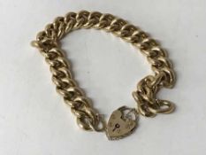 A 9ct gold padlock bracelet, 27.