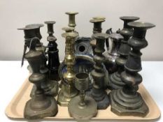 A box of brass candlesticks,