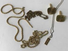 A 9ct gold ingot pendant and chain, 2.7g, together with a rope-twist chain stamped 375, 4.6g.
