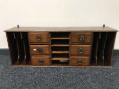 A late Victorian wall mounted correspondence rack