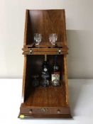 A good quality fitted mahogany table top drinks cabinet