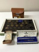 A Parker propelling pencil, a box of late 19th/early 20th century pennies, Smiths travel clock,