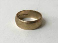 A 9ct gold band ring, 6.